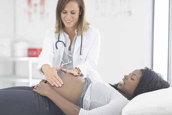 pregnant_woman_on_table
